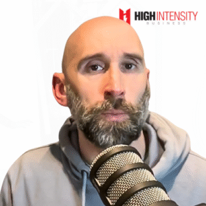 A profile photo of Lawrence Neal with a white background with the High Intensity Business podcast logo on the top-right.